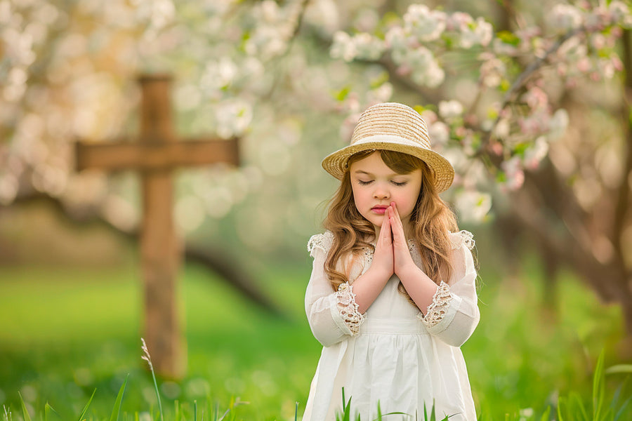 easter cross scene with white blossoms, ideal for holiday photography and religious backgrounds