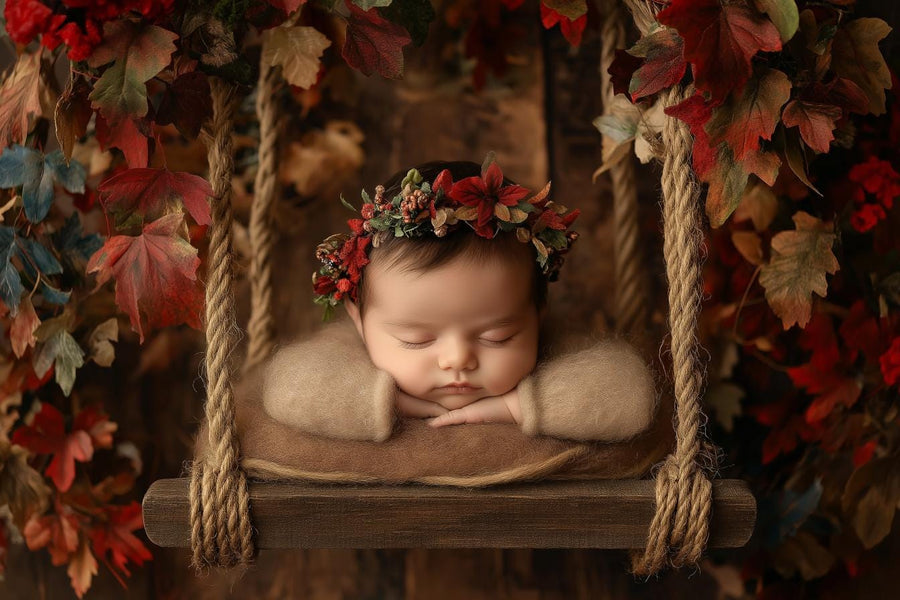 woodland baby scene with autumn leaves, ideal for newborn photography backdrop