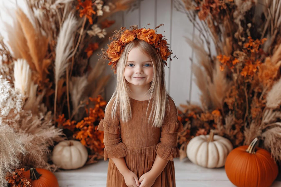 family portrait in boho autumn studio with arch and fall leaves digital background