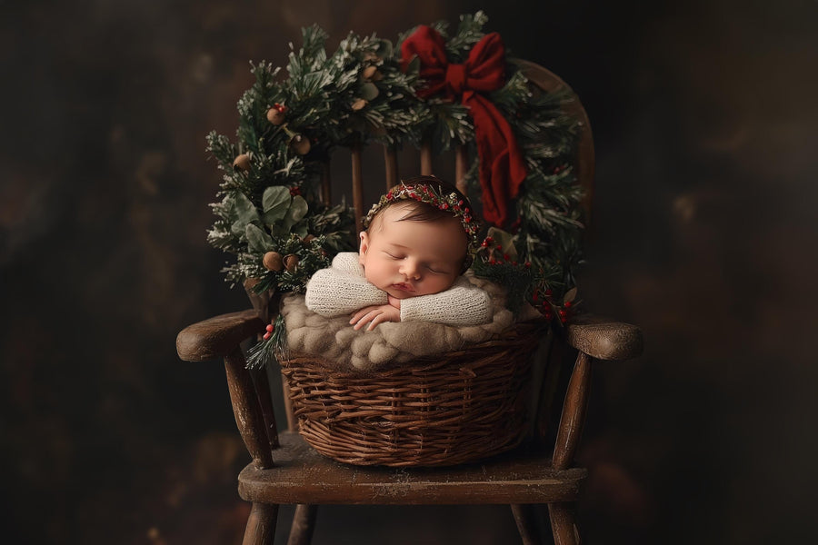 baby with christmas wreath on rustic background, perfect for holiday portraits