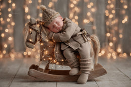 newborn baby with nutcracker face overlay on rocking horse, christmas digital backdrop