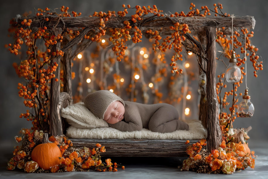 newborn baby boy or girl in autumn woodland scene with pumpkin and fall leaves, suitable for studio or outdoor photography