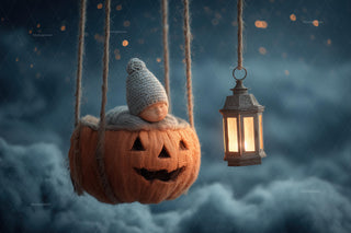 baby with pumpkin and lantern in dreamy night sky background, halloween newborn photo prop