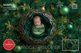 scene with a green christmas ball and holiday backdrop, ideal for newborn photography