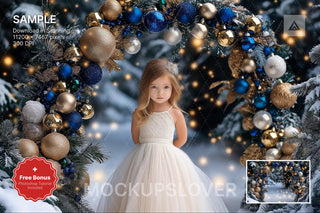 children in festive outfits in front of christmas arch backdrop with fairy lights and winter scenery
