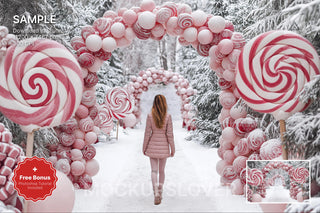 scene of a pink candy cane arch in a winter wonderland backdrop, perfect for holiday kids photo shoots